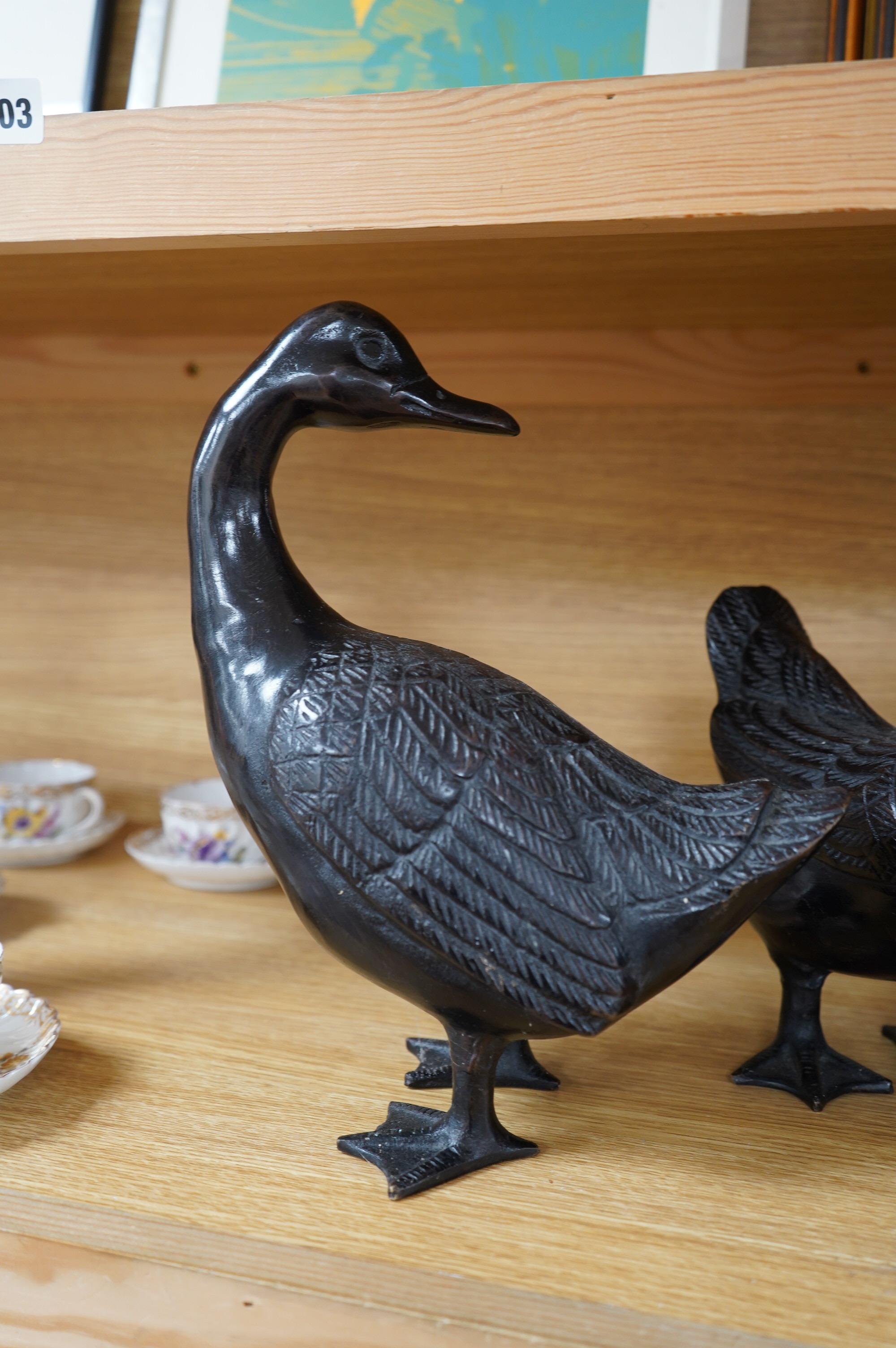 Three contemporary bronze models of ducks, tallest 31cm. Condition - fair to good